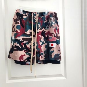 Vibrant Camo Flag Darc Sport Shorts